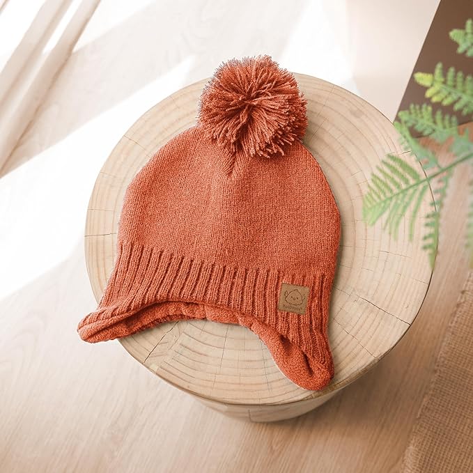 Baby Beanies, Baby Hats for Boys, Girls - Cute Toddler Winter Hat, Soft & Stretchy Beanies for Infant, Newborn 6-36 Months, Cozy & Warm with Earflap Muff & Pom (Regalia)
