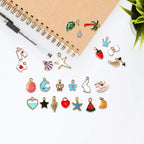 SANNIX 110pcs Assorted Gold Plated Enamel Pendants Necklace Bracelet Charms - Image 3